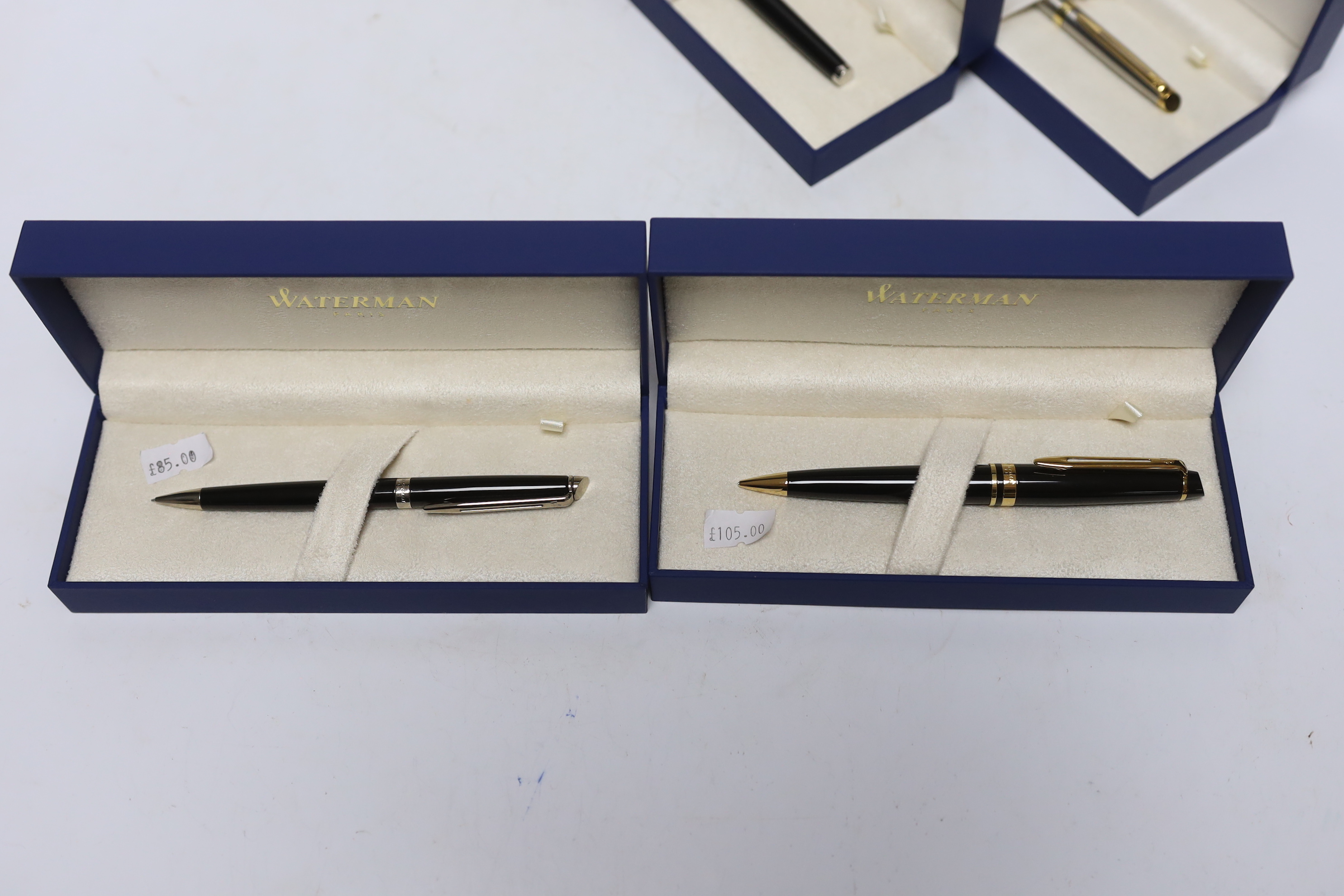 Four Waterman writing implements, including three propelling pencils; two Hemisphere pencils and an Expert pencil, and an Hemisphere fountain pen